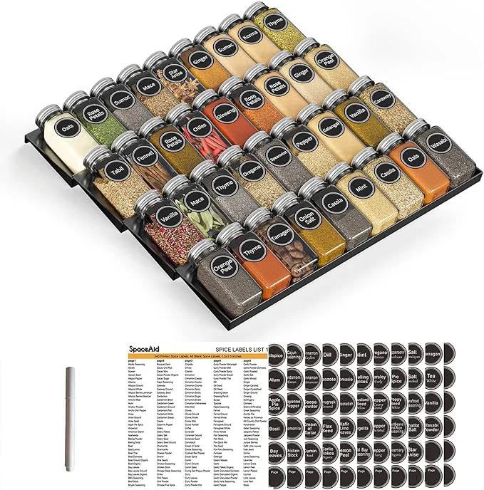 Organizador de especias SpaceAid de 4 niveles para cajón de cocina, incluye 36 tarros de vidrio y 386 etiquetas para una organización eficiente.​

